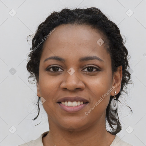 Joyful latino young-adult female with long  black hair and brown eyes