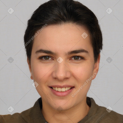 Joyful white young-adult female with short  brown hair and brown eyes