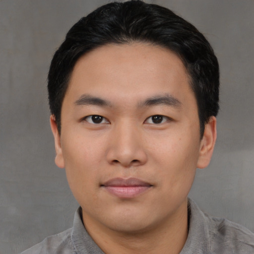 Neutral asian young-adult male with short  black hair and brown eyes