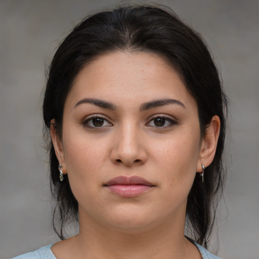 Neutral latino young-adult female with medium  brown hair and brown eyes