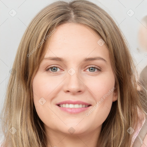 Joyful white young-adult female with long  brown hair and grey eyes