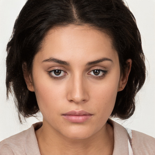 Neutral white young-adult female with medium  brown hair and brown eyes