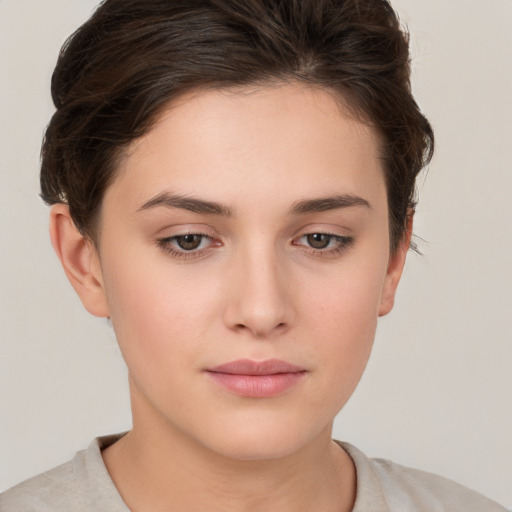 Neutral white young-adult female with short  brown hair and brown eyes