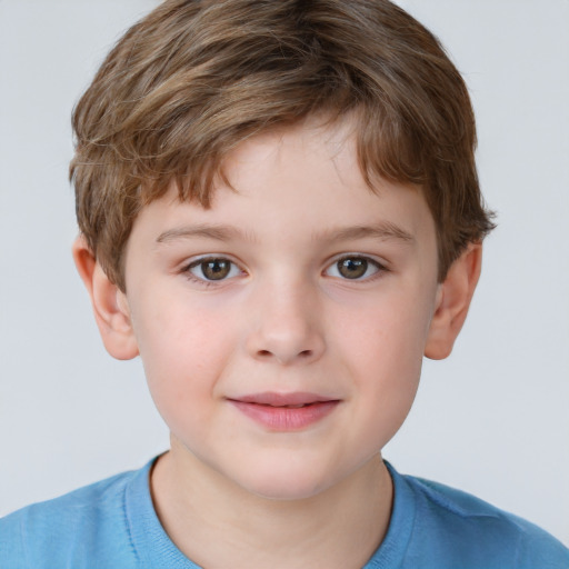 Joyful white child male with short  brown hair and grey eyes