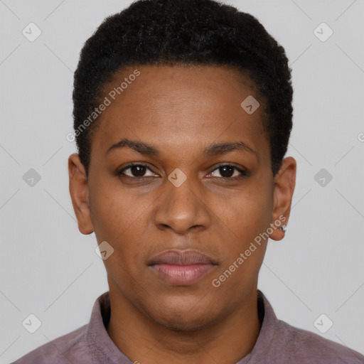 Joyful black young-adult female with short  brown hair and brown eyes