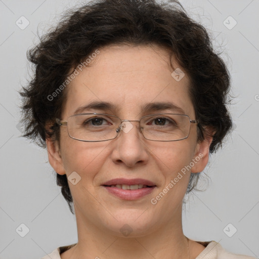 Joyful white adult female with short  brown hair and brown eyes