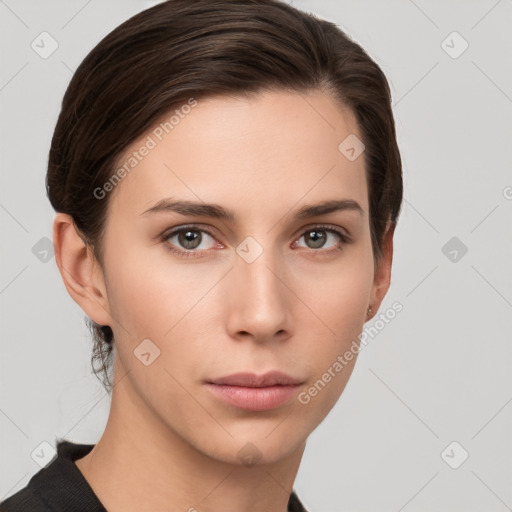 Neutral white young-adult female with short  brown hair and brown eyes