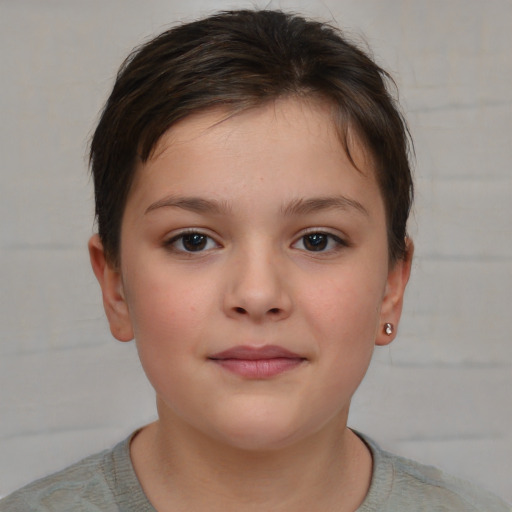 Joyful white child female with short  brown hair and brown eyes