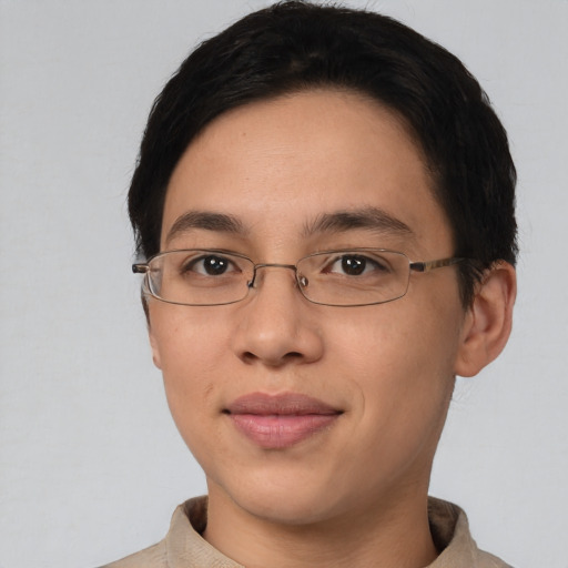 Joyful asian young-adult female with short  brown hair and brown eyes