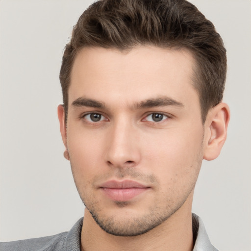 Neutral white young-adult male with short  brown hair and brown eyes