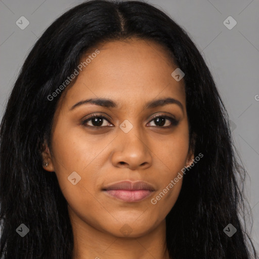 Joyful latino young-adult female with long  black hair and brown eyes