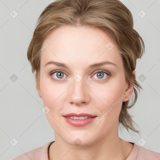 Joyful white young-adult female with medium  brown hair and blue eyes