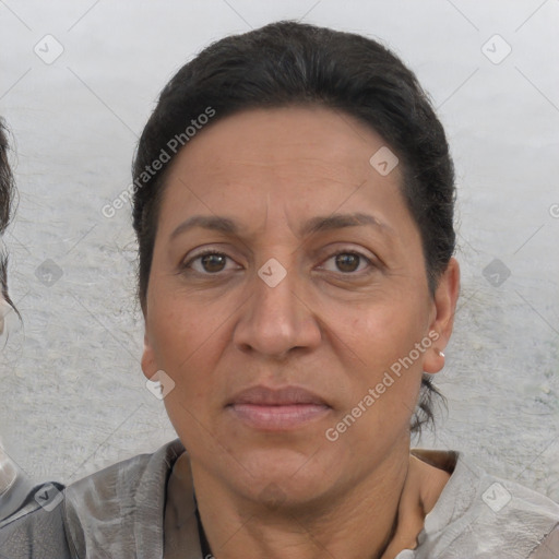Joyful white adult female with short  brown hair and brown eyes