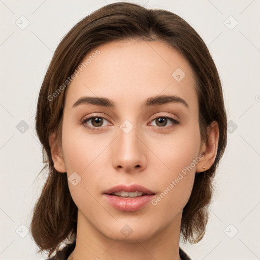 Neutral white young-adult female with medium  brown hair and brown eyes