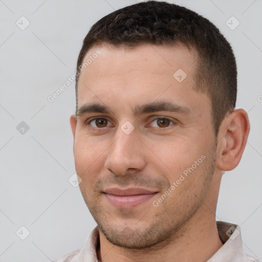 Joyful white young-adult male with short  brown hair and brown eyes