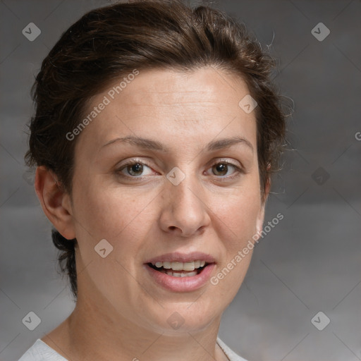 Joyful white adult female with medium  brown hair and grey eyes