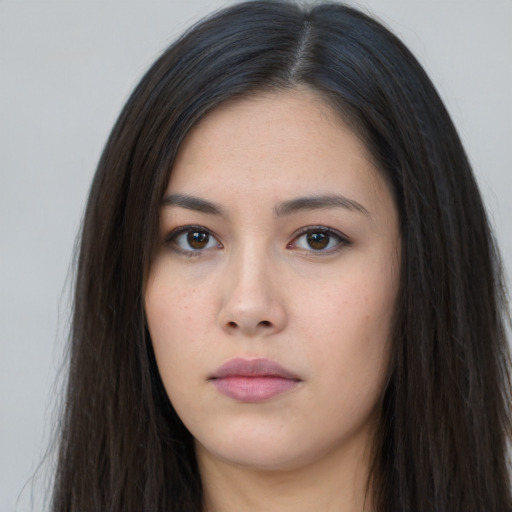 Neutral asian young-adult female with long  brown hair and brown eyes