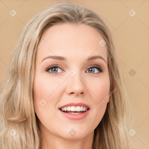 Joyful white young-adult female with long  brown hair and blue eyes