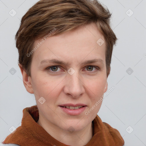 Joyful white young-adult female with short  brown hair and grey eyes