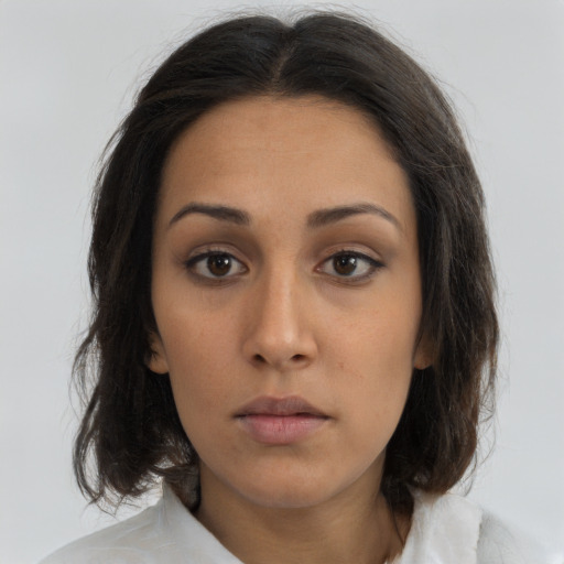 Neutral asian young-adult female with medium  brown hair and brown eyes