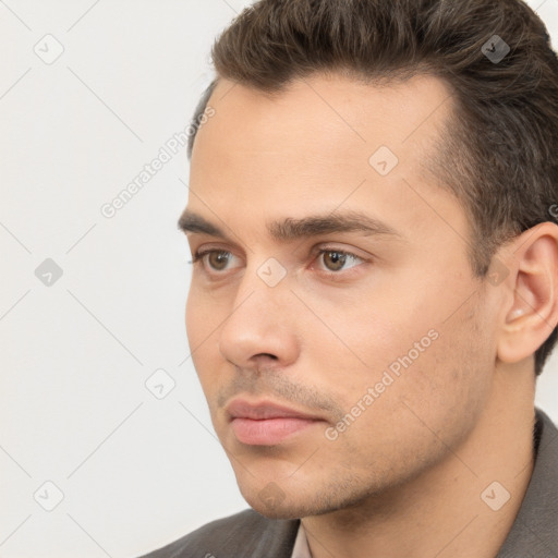 Neutral white young-adult male with short  brown hair and brown eyes