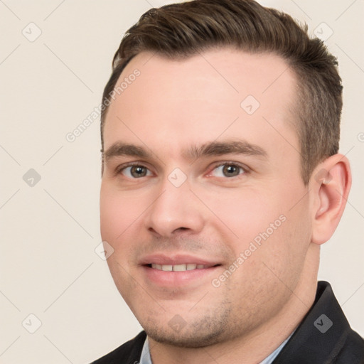 Joyful white young-adult male with short  brown hair and brown eyes