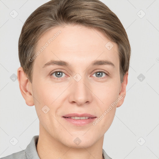 Joyful white young-adult female with short  brown hair and grey eyes