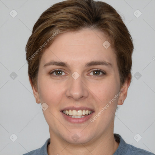 Joyful white young-adult female with short  brown hair and grey eyes