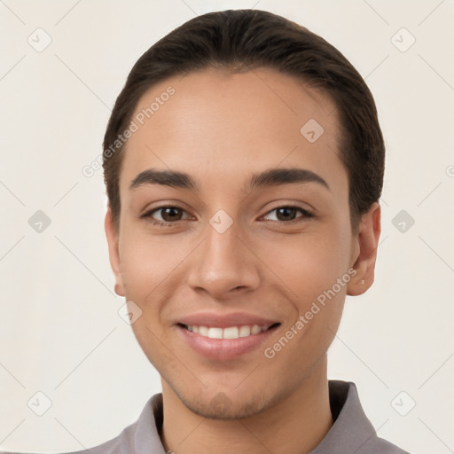 Joyful white young-adult female with short  brown hair and brown eyes