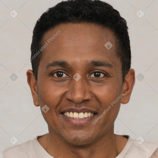 Joyful black young-adult male with short  black hair and brown eyes
