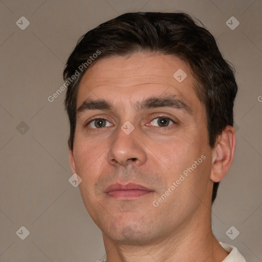 Neutral white adult male with short  brown hair and brown eyes