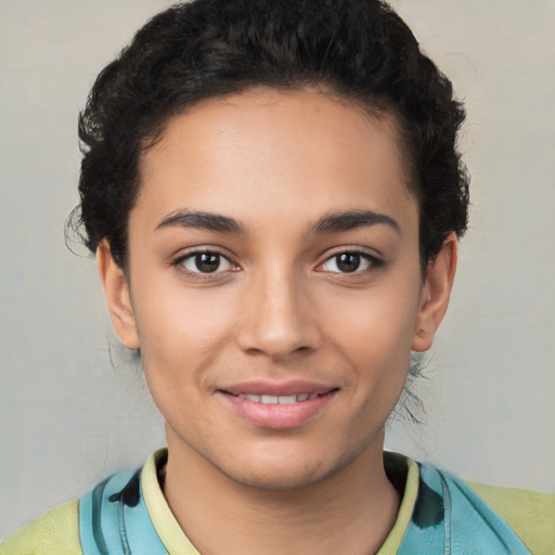 Joyful latino young-adult female with short  brown hair and brown eyes