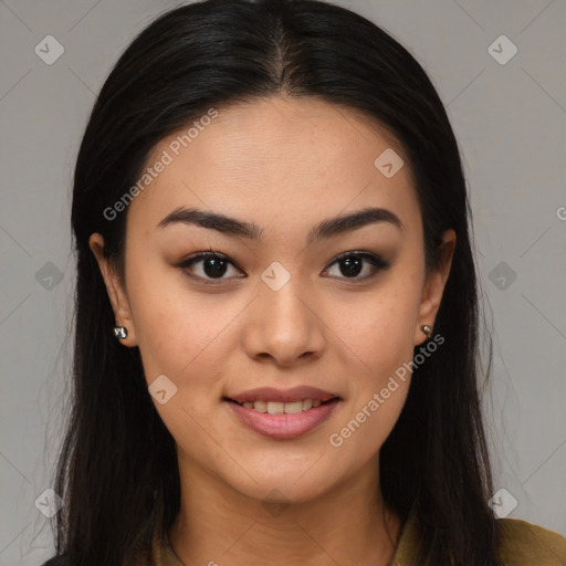 Joyful asian young-adult female with long  brown hair and brown eyes