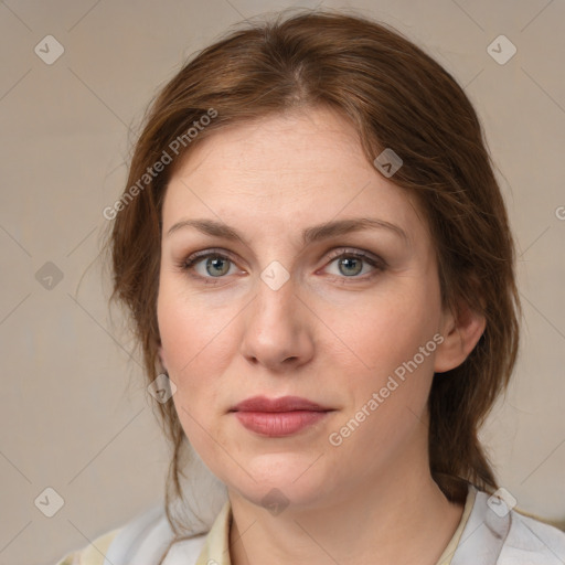 Joyful white young-adult female with medium  brown hair and green eyes