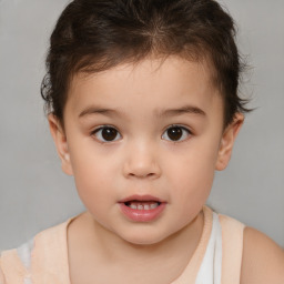 Joyful white child female with short  brown hair and brown eyes