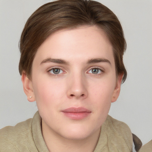 Neutral white young-adult female with short  brown hair and grey eyes