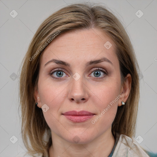 Joyful white young-adult female with medium  brown hair and blue eyes