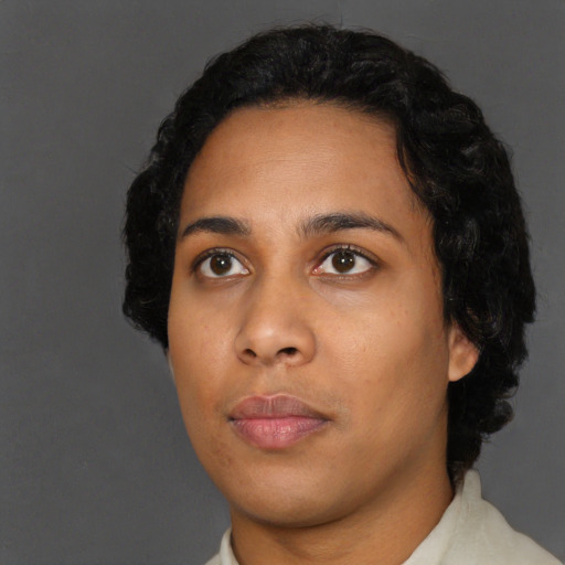 Neutral black young-adult female with short  black hair and brown eyes