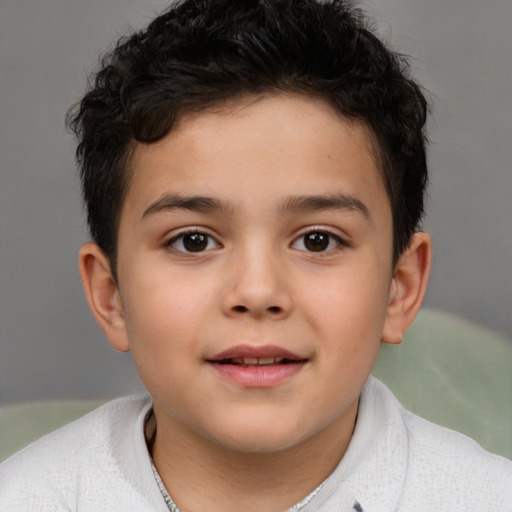 Joyful white child male with short  brown hair and brown eyes