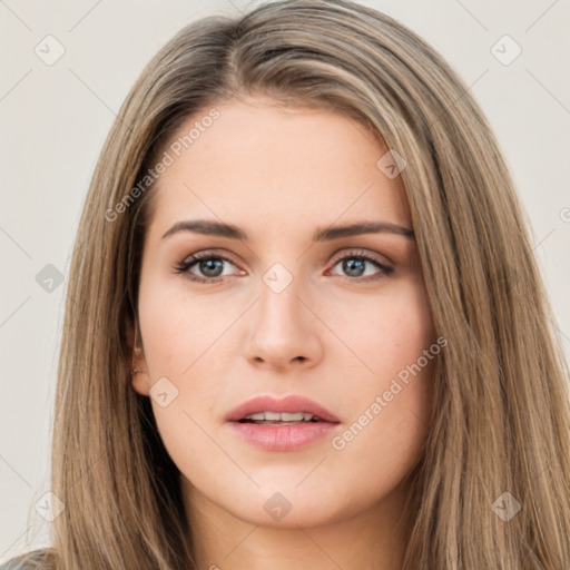 Neutral white young-adult female with long  brown hair and brown eyes