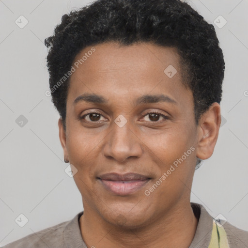 Joyful black young-adult male with short  black hair and brown eyes