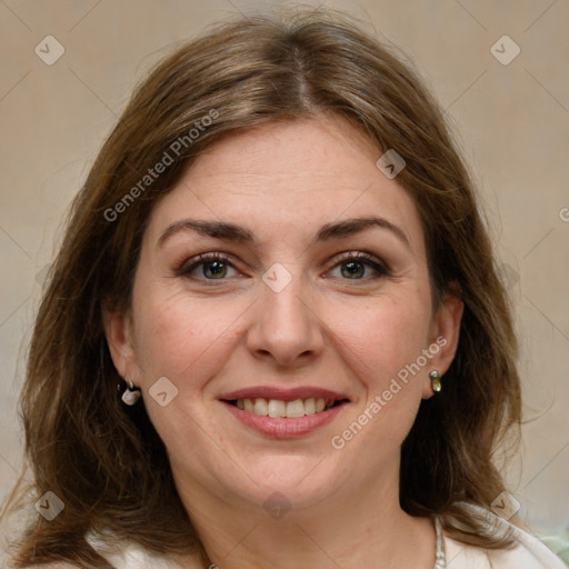 Joyful white adult female with medium  brown hair and grey eyes