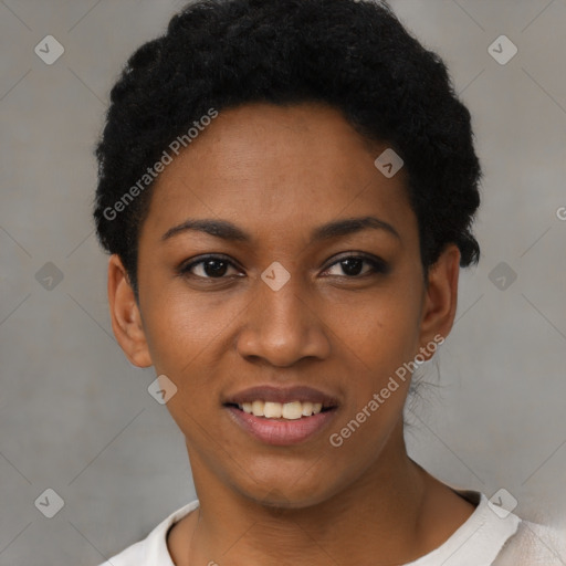 Joyful black young-adult female with short  black hair and brown eyes