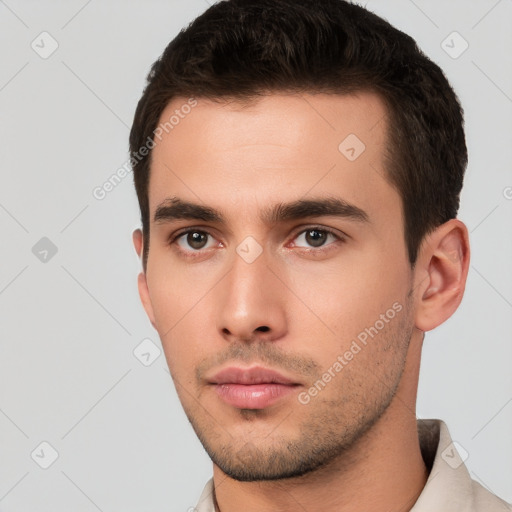 Neutral white young-adult male with short  brown hair and brown eyes