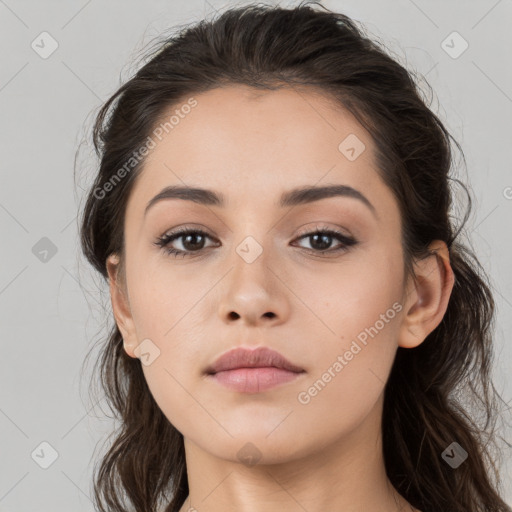 Neutral white young-adult female with long  brown hair and brown eyes