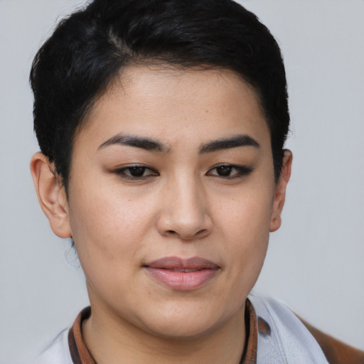 Joyful asian young-adult female with short  brown hair and brown eyes