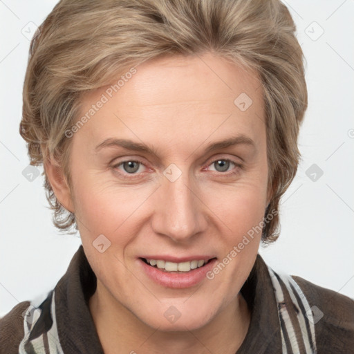 Joyful white adult female with medium  brown hair and grey eyes