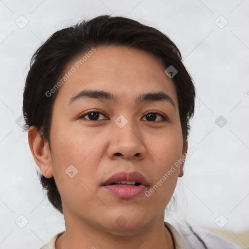Joyful white young-adult female with short  brown hair and brown eyes