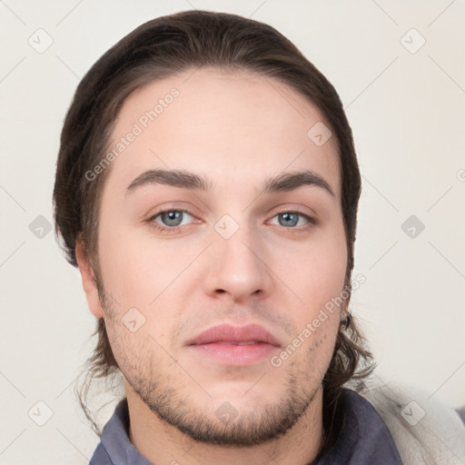 Neutral white young-adult male with short  brown hair and grey eyes