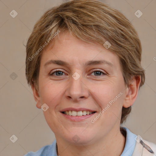 Joyful white young-adult female with medium  brown hair and blue eyes